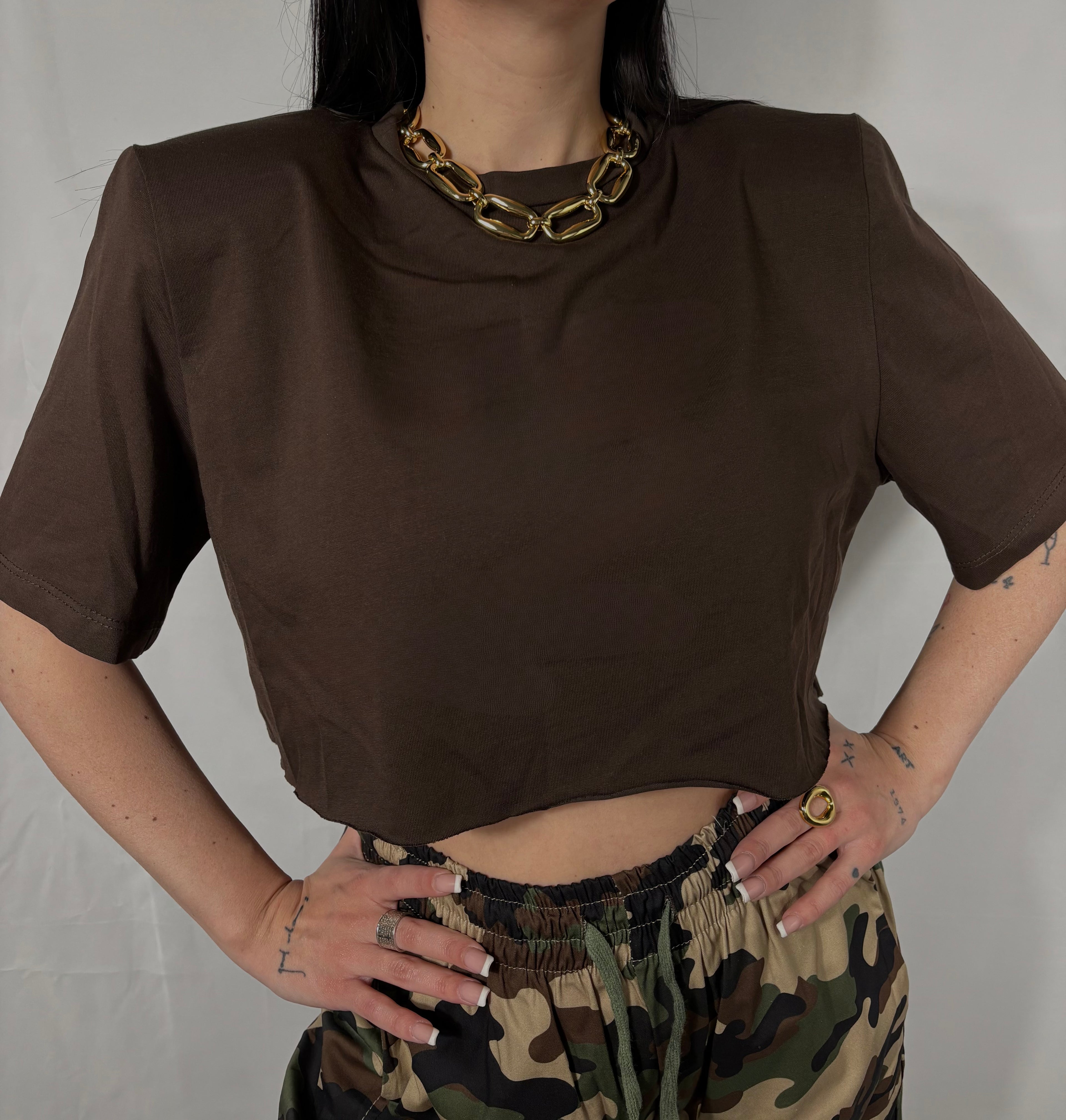 Maglia crop con spalline