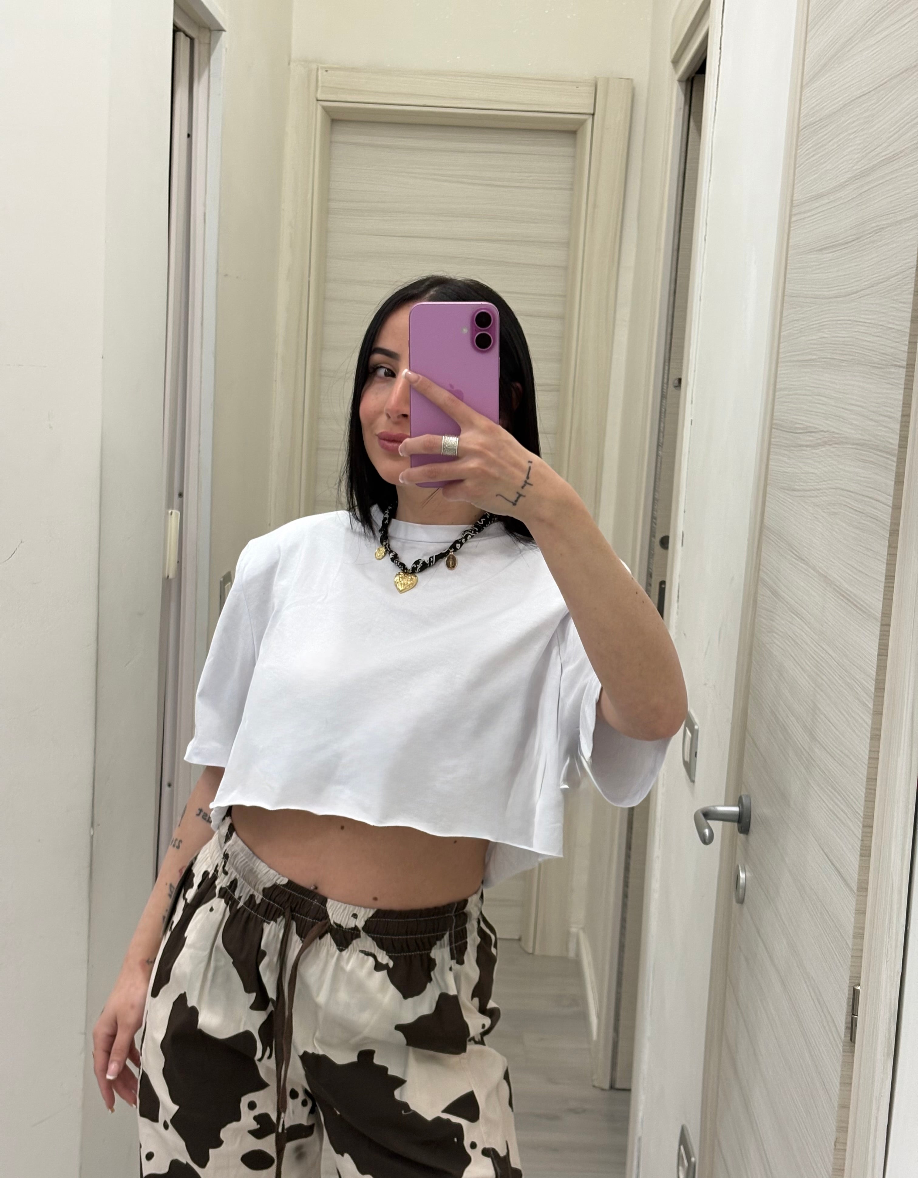 Maglia crop con spalline